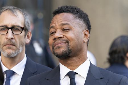Actor Cuba Gooding Jr. listens as attorney Mark Heller addresses press after arraignment in Manhattan's New York State Supreme Court.
Actor Cuba Gooding Jr. is facing charges of sexual abuse. Fourteen women have accused him of unwanted sexual advances over a period of 20 years. The most recent accusations relate to incidents in a Manhattan nightclub in 2018 and at a rooftop of a bar near Times Square in June 2019.