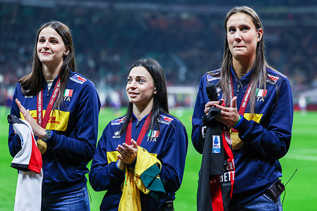 (R–L) Prominent volleyball players Anna Danesi, Eleonora Fersino, and Benedetta Sartori were awarded medals and honored during the AC Milan vs. ACF Fiorentina Serie A 2025/26 football match at San Siro Stadium, following their recent victory in a major international volleyball tournament with the Italian National Team.