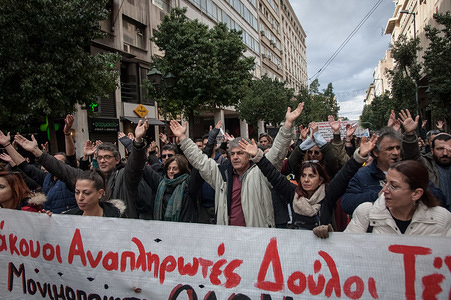 Protesters are seen shouting slogans while holding a banner during the demonstration.
Teachers from all over Greece demonstrate against a new law regulating the appointment/hiring of the permanent teaching staff in the public school system in Athens, Greece.