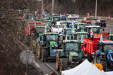 Tractors seen blocking the A15 highway on the outskirts of Paris, during the farmers' strike. Agriculture workers block eight of the main access points to the French capital during the French farmer's strike. In Argenteuil, north of Paris, around 30 tractors blocked the A15 highway.