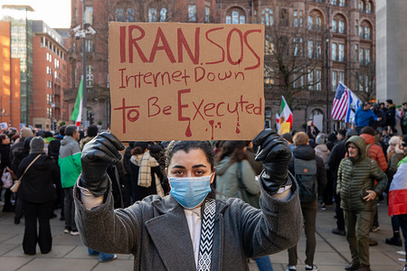 A protester holds a placard expressing her opinion during the demonstration. A large pro-Iranian regime change demonstration, of in excess of 1000 people, supporting ongoing anti-regime protests within Iran. Many participants held portraits of Reza Pahlavi, the exiled son of Iran’s last Shah. Simultaneously, the Central library in St Peter’s Square became the site of a tense standoff between a small gathering representing the far-right group Prioritise Britain. This demonstration centered on nationalist themes and "remigration". A counter-protest of approximately 300 anti-fascist demonstrators was organized by Manchester Stand Up to Racism and local socialist collectives. The anti-fascist protesters occupied the square with banners and chants of "refugees are welcome here". A heavy police presence was deployed to keep the factions separated.