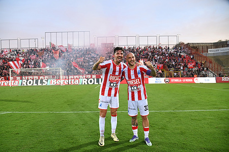 Filippo Costa of LR Vicenza and Claudio Morra of LR Vicenza pose for a photo as they celebrate victory at the end of the match (scorers of the winning goals) during the 2026 Serie C Football game L.R. Vicenza vs FC Arzignano Valchiampo at Romeo Menti Stadium. Final score LR Vicenza 2:1 FC Arzignano Valchiampo
