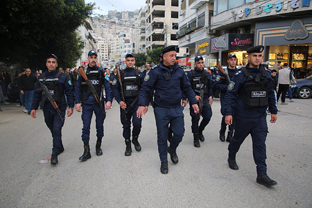Palestinian police secured the streets of Nablus during the Holy Fire ceremony, which was brought from the Church of the Holy Sepulchre, at the Orthodox Church of the Annunciation in Nablus, West Bank, as part of the Holy Saturday celebrations, also known as Easter Vigil Mass.