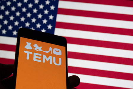 In this photo illustration, a Temu logo seen displayed on a smartphone with a flag of America / USA in the background. Temu made a splash in the U.S., going up against Amazon and Shein.