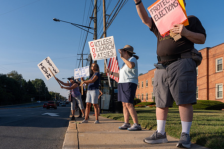 People demonstrate against President Trump near Forest Glen Metro,