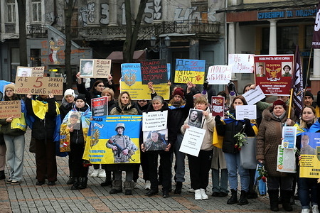 Participants seen with posters and flags expressing their opinions pose for a photo on Greek Square. Peaceful march in remembrance and support for missing, captured defenders of Ukraine in the city center Odessa. The organizers are families of prisoners of war. The goal is to draw public attention to the problem of the exchange of prisoners of war held in the Russian Federation and the search for missing persons.