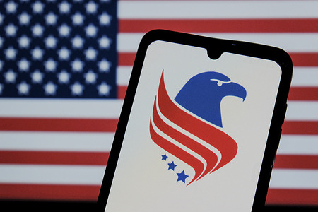 In this photo illustration, the America Party logo is seen displayed on a smartphone screen with Flag of America in the background. Elon Musk recently announced the formation of a new political party called the "America Party" on July 5, 2025. This came after a public fallout with US President Donald Trump.