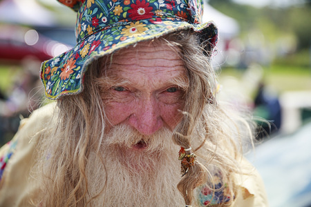 Allyn Richardson, also known as Grandpa Woodstock, poses for a photo at Hector's Inn in Bethel. Woodstock organizer Michael Lang's event was canceled but anniversary activities continued at Arrowhead Ranch, Bethel Woods (the site of the original Woodstock in 1969), Hector's Inn, and Yasgur's Farm.