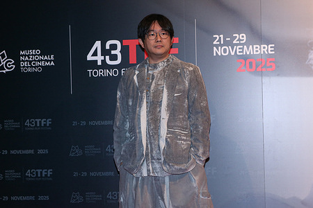 Tsuta Tetsuichiro attends the photo call on Day 8 of the 43rd Turin Film Festival.