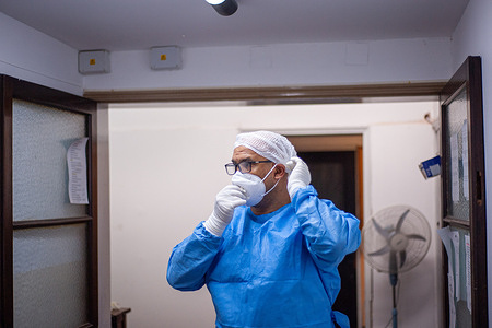 A nurse gets ready to enter San Martin Hospital ICU to check on COVID-19 patients.
With roughly 50% occupation, things do not look bad yet in the country, but Argentina's healthcare system is close to collapse as the second wave of COVID-19 hits.