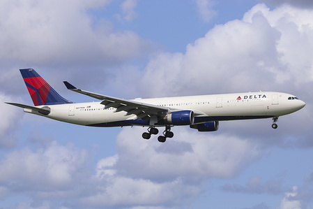 Delta Air Lines Airbus A330-300 landing at Amsterdam Schiphol International Airport in The Netherlands. The aircraft has the registration N817NW. Delta Airlines connects Amsterdam to Atlanta, Boston, Detroit, Los Angeles, Minneapolis/St. Paul, New York JFK, Orlando, Portland (OR), Salt Lake City, Seattle Tacoma and Tampa in the United States.