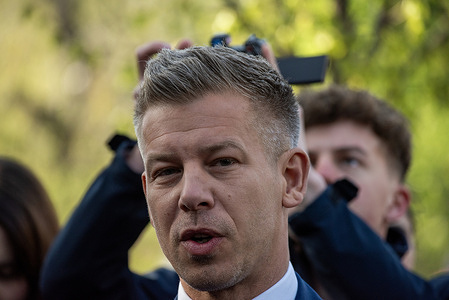 The President of the Tisza Party, Peter Magyar looks at the camera during his reply on his press conference in Budapest. The President of the Tisza Party, Peter Magyar - the biggest opposition of Viktor Orban and the Fidesz - went to a polling station (Hegyvideki Mesevar Ovoda) to vote and then he held a press conference for the Hungarian and international media in Budapest.