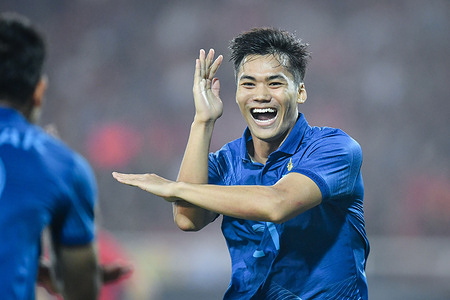 Poramet Arjvirai of Thailand celebrates after scoring a goal during the AFF Mitsubishi Electric Cup 2022 match between Vietnam and Thailand at My Dinh National Stadium. Final score; Vietnam 2:2 Thailand.