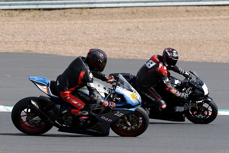 Kirill Bitkov (L)(12) (Komsomola-14) during the Saint Petersburg Championship Endurance Road Race in the Leningrad region, Russia, at the motordrome "Igora Drive". 07/06/2026