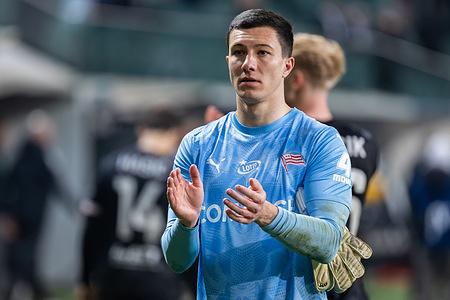 Sebastian Madejski of Cracovia applauds during the Polish PKO BP Ekstraklasa League match between Legia Warszawa and Cracovia at Marshal Jozef Pilsudski Legia Warsaw Municipal Stadium. Final score; Legia Warszawa 1:0 Cracovia.