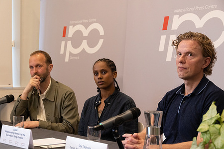 (L-R) Chief of the Danish Melodi Grand Prix, Erik Struve, Saba Lykke Oehlenschlæger aka SABA who is representing Denmark at this year's Eurovision and Renowned Eurovision expert and the Danish Broadcasting Corporation’s Eurovision commentator, Ole Tøpholm seen during a press briefing at The International Press Centre (IPC) ahead of the Malmö 2024 Eurovision Song Contest.