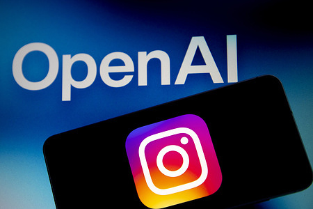 In this photo illustration, the Instagram logo is seen displayed on a mobile phone screen with an OpenAI logo in the background.