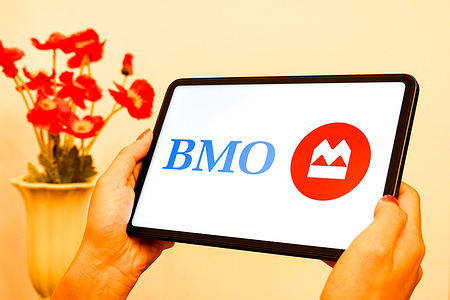 In this photo illustration, the logo of Bank of Montreal (BMO) is displayed on the screen of a tablet.