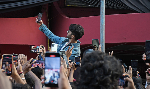 Bollywood actor Shahid Kapoor takes a selfie with fans as he promotes his upcoming film O'Romeo outside a multiplex in Mumbai. The film will be release on 13th February 2026.