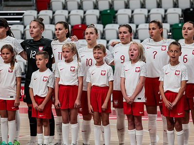 Poland’s women’s national futsal players sing the national anthem before the friendly match between Poland and Portugal at Sosnowiec Arena Final score Poland 2 : 4 Portugal