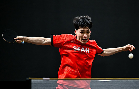 Jang Woojin of South Korea competes against Leo de Nodrest of France during the Men's Singles Round of 16 match at the WTT Star Contender Doha 2026 at the Lusail Sports. Arena.Jang Woojin won over Leo de Nodrest 3-0