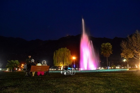Visitors are seen relaxing at Asia's largest Tulip garden during a spring day in Srinagar.
Spring has arrived in Kashmir valley, which marks a thawing of the lean season for tourism in the Himalayan region.