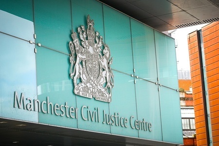 Α view of the entrance of Manchester Civil Justice centre. 
Manchester Civil centre is a governmental building and it stands in the city center of Manchester.