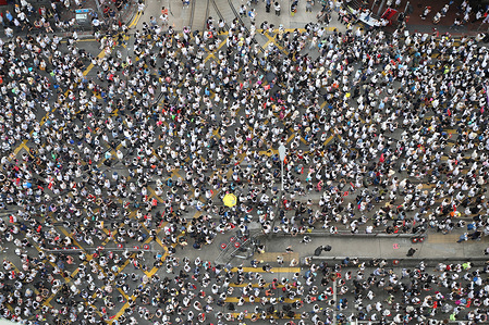Hundreds of thousands of demonstrators took to the street of Hong Kong to protest against the extradition bill being put forward by the Hong Kong government which the people of Hong Kong fear it could be used as a political tool by the Beijing central government to arrest and transfer political activists who are against the Chinese government to the mainland.