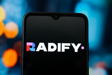 In this photo illustration, the Radify Metals logo is seen displayed on a smartphone screen.