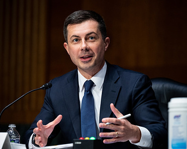 U.S. Secretary of Transportation Pete Buttigieg speaking at a hearing of the Senate Environment and Public Works committee.