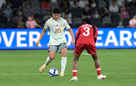 Zhang Chengxue (L) of China Women Football team and Shamsunnahar Junior (R) of Bangladesh women football team seen in action during the AFC 2026 Women Asia Championship Group match between China and Bangladesh held at the Western Sydney Stadium. Final score China 2:0 Bangladesh.
