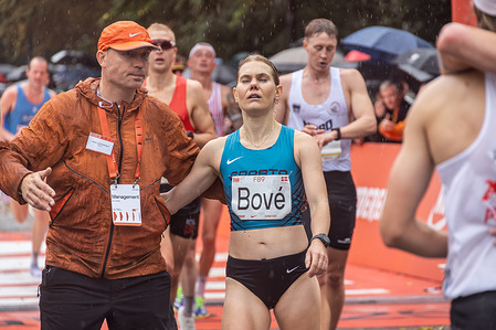 The second Danish female athlete Nanna Bové of Denmark and Sparta Atletik og Løb crosses the finishing line during the CPH Half 2025. At the Copenhagen Half Marathon, 32,000 participants are running 21.0975 km through the streets of the Danish capital. 
Copenhagen Half Marathon comes from the fact that it’s a half-marathon distance race, which is 21.0975 km (13.1 miles) — exactly half the length of a full marathon (42.195 km).