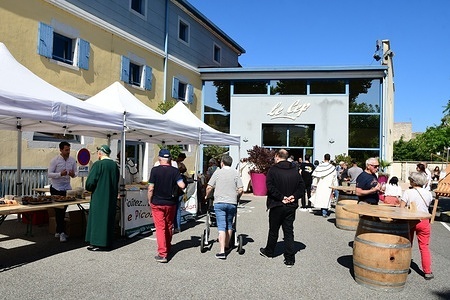 Children play wooden games during the Spring Festival in the village of Saint-Péray. This is an annual event organized by the winemakers of the Saint-Péray AOC to bring together winemakers, highlight the AOC wines and boost local tourism.