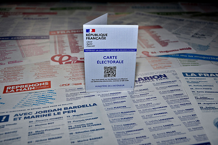 In this photo illustration, a French electoral card is placed on ballot papers for the European elections. The European elections will take place in France on June 9, 2024.