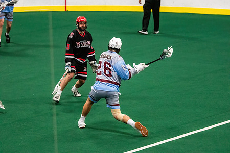 Calgary Mountaineers (blue/Grey) Jeremy Wudrick (26) winds up a shot on net against Burlington Blaze defender (black/Red) Brendan Boyle (9) in Minto Cup Day 2 action between Calgary Mountaineers and the Burlington Blaze at Bill Hinter Arena.
Calgary Mountaineers vs Burlington Blaze, 6:8