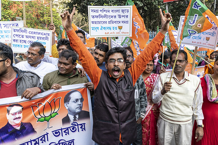 A BJP supporter chants slogan during the rally.
BJP (Bharatiya Janata Party) supporters participate in a rally supporting the CAA (Citizenship amendment act) 2019 and NRC (National register citizens) in kolkata.