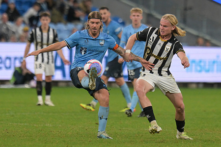 Nathan Luke Brattan (L) of Sydney FC team and Lachlan Michael William Rose (R) of Macarthur FC are seen in action during the Isuzu UTE A-League 2023-24 season Elimination Finals match between Sydney FC and Macarthur FC held at the Allianz Stadium. Final score Sydney FC 4 : 0 Macarthur FC.