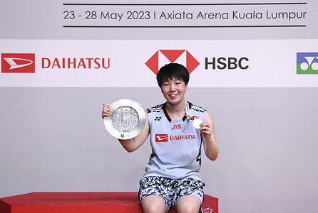 Akane Yamaguchi of Japan poses with her winner medals at the podium after defeating Gregoria Mariska Tunjung of Indonesia during the Women's Singles final match of the Perodua Malaysia Masters 2023 at Axiata Arena. Akane Yamaguchi won with scores; 21/21 : 17/7.