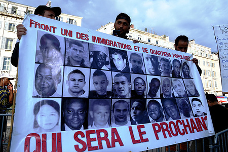 Protesters hold a banner with portraits of victims of police brutality during the demonstration.
Despite a ban on public gatherings due to the coronavirus pandemic, tens of thousands of people took to the streets across France to protest against police brutality, racism and to demand Justice for ‘Adama Traore’ - a 24-year-old who died in police custody four years ago. The case according to protesters, happened in circumstances similar to the death of the unarmed African-American man George Floyd on May 25 in the US city of Minneapolis.