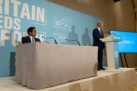 Zia Yusuf, head of policy at Reform UK and Reform UK Leader Nigel Farage attend a post budget conference in London.