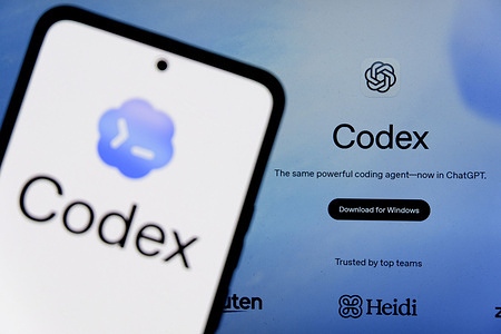 In this photo illustration, the OpenAI's AI coding agent Codex logo is seen displayed on a smartphone screen and OpenAI Codex Website in the background.