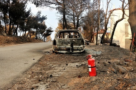 A charred vehicle after a wildfire north of Athens.
The aftermath of the destruction by the forest fires in Mati and Neos Voutsas regions of Attiki with more than 80 dead and an unimaginable destruction of property.