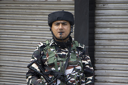 Indian paramilitary trooper keeps vigil at the city center Lal Chowk on the sixth anniversary of the abrogation of Article 370 and Jammu and Kashmir's special status. Indian Prime Minister Narendra Modi's government repealed Article 370 on 5th August 2019, ending the region's statehood special semi-autonomous status.