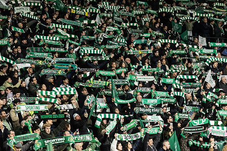 Sporting CP fans hold scarves during the UEFA Champions League Matchday 7 between Sporting CP and Paris Saint-Germain (PSG) at Estadio de Alvalade Stadium. Final score; Sporting CP 2-1 Paris Saint-Germain (PSG)