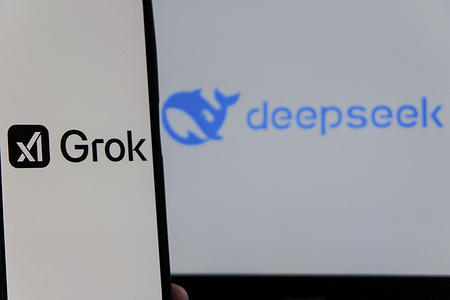 In this photo illustration, the Deepseek AI logo is seen displayed on a smartphone screen with xAI Grok logo in the background. Grok is a generative artificial intelligence chatbot developed by xAI.