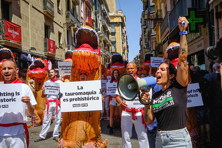 A protester chants slogans through the megaphone in demand for the abolition of bullfighting during the demonstration. A protest was organised in Pamplona by members of PETA (People for the Ethical Treatment of Animals) calling for the abolition of bullfighting a day before the San Fermín festivities.