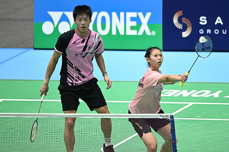 Yang Po-Hsuan (L) and Hu Ling Fang (R) of Chinese Taipei seen in action during the 2022 SATHIO GROUP Australian Badminton Open mixed doubles match against Kyohei Yamashita and Natsu Saito of Japan. Yang and Hu won the match, 17-21, 21-19, 21-12.
