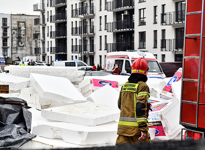 Emergency services seen at the scene of the accident. The tragic accident occurred at the construction site at Domagaly (Zlotyn housing estate). A disused construction crane was overturned by strong winds, killing two workers at the site.
