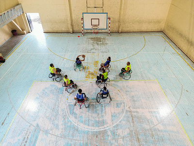 (EDITOR’S NOTE: Image taken with a drone)
A wheelchair basketball team getting ready to shoot a basket. War-wounded set up a wheelchairs basketball club​, to integrate war casualties into society through the game of basketball, and the teams became a door for entertainment and meeting where Al-Ahly and Al-Ittihad teams play against each other.