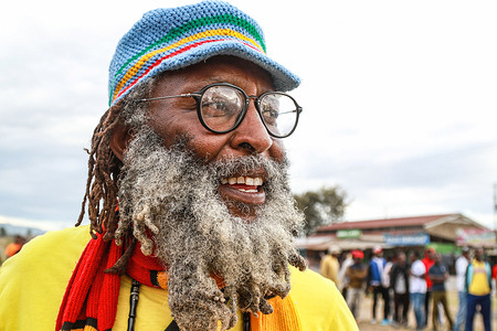Barbushe Maina, a thespian and The Nakuru UNESCO Creative City alternative contact, looks on during a reggae concert to commemorate Nakuru's inclusion in the UNESCO Creative Cities Network as a city of culture and folk arts at an open ground near Nakuru Town. The reggae music event was done to spread happiness and good vibes in society.